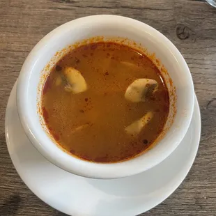 a bowl of soup on a plate