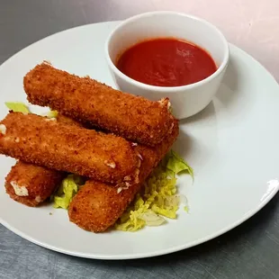 Homemade mozzarella sticks with marinara. Available for dinner now!