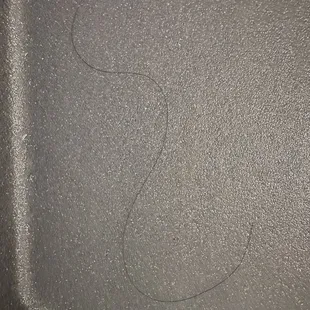 The reddish brown hair