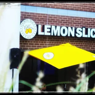 a yellow umbrella outside