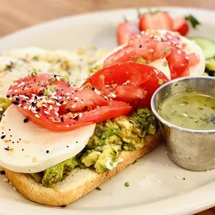 Avocado Toast~ smashed avocados with lemon, marinated tomatoes, olive oil, (add fresh mozzarella &amp; basil vinaigrette +$2)