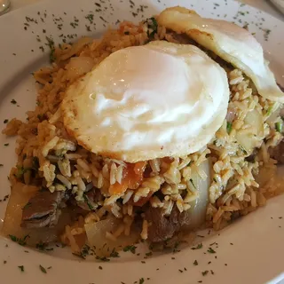 Se me Cayo el Arroz de Lomo, Pollo o Mariscos