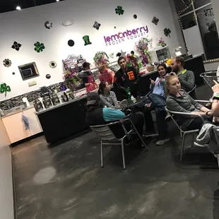 a group of people sitting in a room