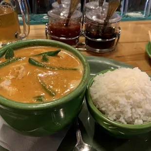 Red curry with chicken and string beans. Not spicy. Good flavor. Needs more rice.