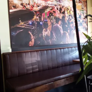 The artwork at the entryway.  If I'm not mistaken, it depicts Bangkok.