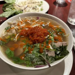 Pho Tai with chili paste and sriracha added