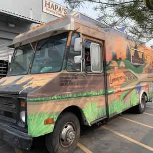 a food truck painted in a tropical theme