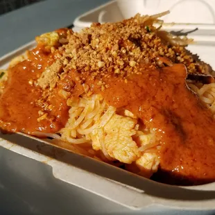 a plate of noodles and sauce