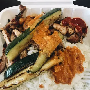 Grilled chicken plate (that comes with zucchini and rice) is actually tasty! Their peanut butter sauce makes it even better