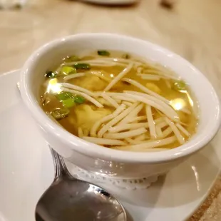 a bowl of soup on a plate