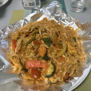 Chicken rice noodles with coconut based sauce