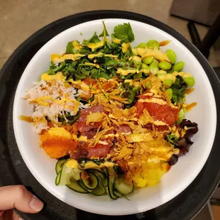 Poke bowl with spicy tuna, upgraded tuna and salmon.