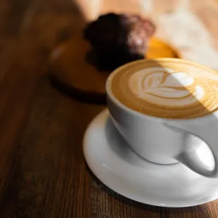 a cup of coffee and a donut