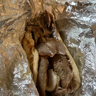 a sandwich wrapped in foil
