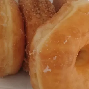 Some glazed, sugar n crumb donuts