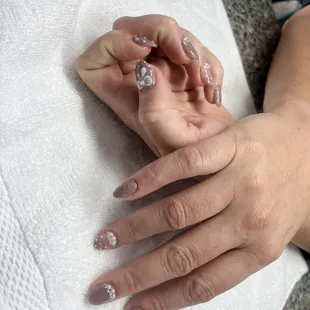 This is my manicure I wanted to match. A mauve color. Not purple. My manicure was NOT done at this salon.