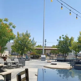 Expansive patio with flag pole.