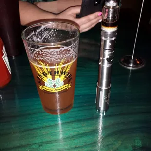 a pint of beer and a cigarette