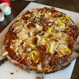 A delicious BRICK OVEN pizza topped how we wanted.