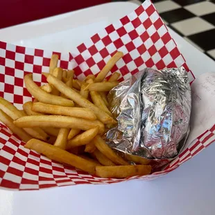 Basic cheeseburger and fries. Love how it comes out in foil to keep it warm