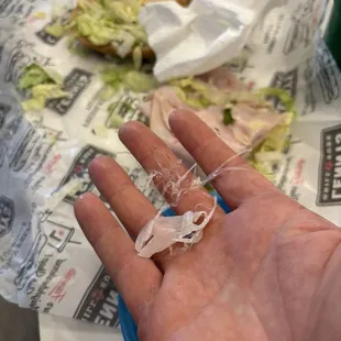 This was in our sand which- a long piece of plastic so disgusting. Tried multiple times to call but the line is always busy. So gross
