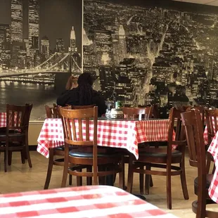 Wall mural and red checkerboard tablecloths