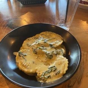 Mushroom ravioli with spinach Alfredo