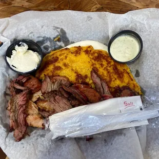 Cachapa with some steak and sausage