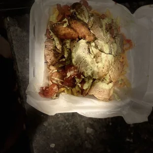a plastic container filled with food