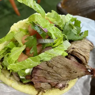 Carne Asada Arepa with cheese and salad