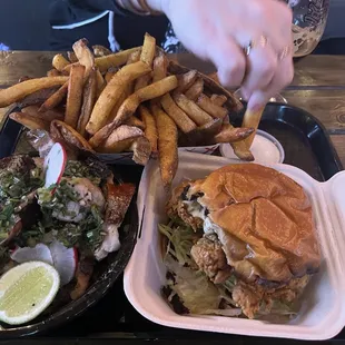 a plate of food with a sandwich and french fries