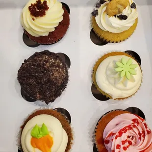 $3.65 per cupcake - red velvet, cookie dough, cookies n cream, keylime, carrot, and strawberry