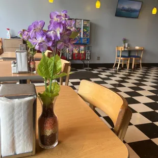 a vase of flowers on a table