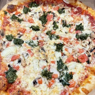 Veggie pizza- no Bell peppers- to go. Delicious!