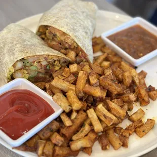 Breakfast Burrito with Potatoes (bomb sauce) IG: @ammysalamii