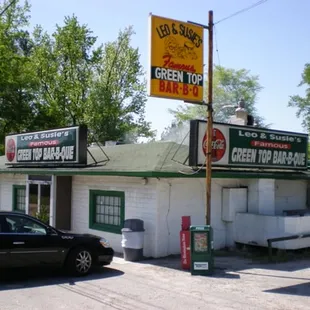 a car parked in front of the restaurant