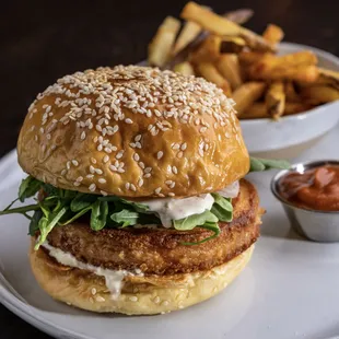 a burger and fries on a plate