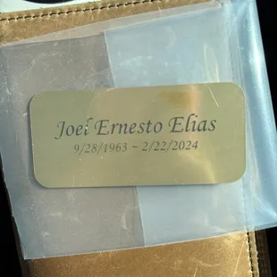 Engraved plate for urn