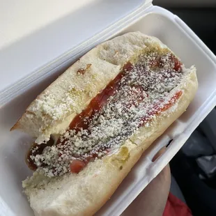 Hot dog without mustard, onions, and peppers.