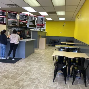 Indoor seating has about 7 tables.