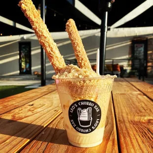 a cup of churros