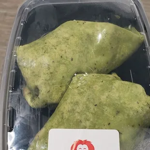 Bacon jam turkey club in a spinach wrap