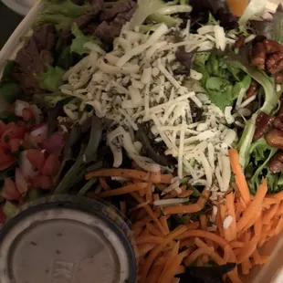 Custom large salad with steak.