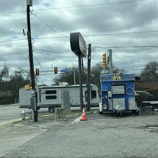 Blue taco truck on the corner of Sunshadow and Perrin Beato