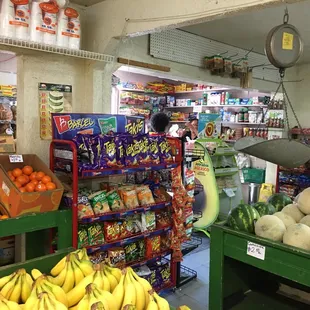 a fruit and vegetable section in a grocery store