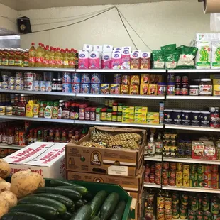 a grocery store filled with vegetables