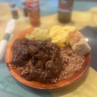 Oxtails, rice &amp; peas, Mac n cheese, and steamed cabbage.