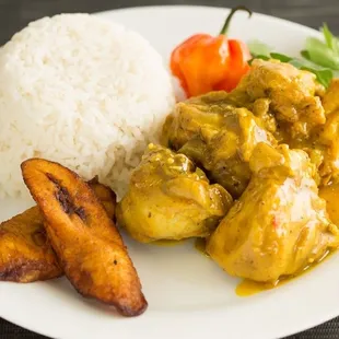 Curry Chicken, white rice, and fried plantains