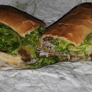 Steak and cheese sub with extra lettuce