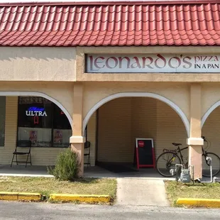 back entrance (I&apos;d consider this the carry-out entrance) on the south side of the restaurant, basically facing Publix and Book Gallery West